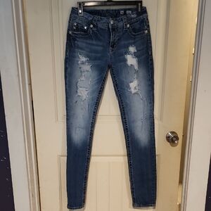 Women's Distressed Blue Jeans